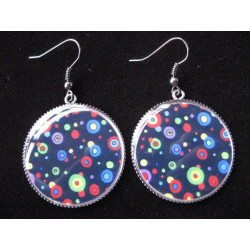 Fancy earrings, multicolored polka dots on a black background, set in resin