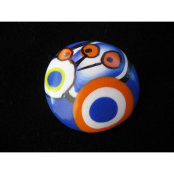 Pop ring, orange / white patterns, on a blue Fimo background