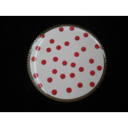 Fancy ring, red polka dots on a white background, set with resin
