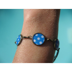 Small cabochons bracelet, white polka dots on a blue background