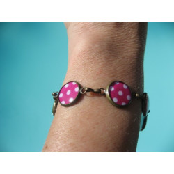Small cabochons bracelet, white polka dots on a fuchsia background
