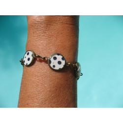 Small cabochons bracelet, black polka dots on a white background