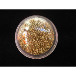 BAGUE dome, microperles dorées mobiles, dans une demi-sphère en plexi