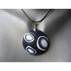 Pop pendant, black and white patterns on a blue background, in fimo