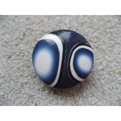 Pop ring, black and white patterns on a blue background, in fimo
