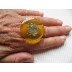 Large ring, silver microbeads, on yellow resin
