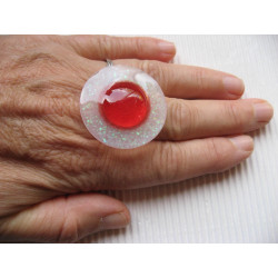 Large ring, large red pearl, on white resin background