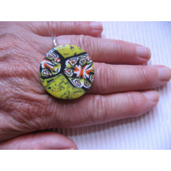 Fancy ring, multicolored on a yellow background, in Fimo