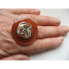 Large ring, brown and beige spiral in fimo, on a brown resin background